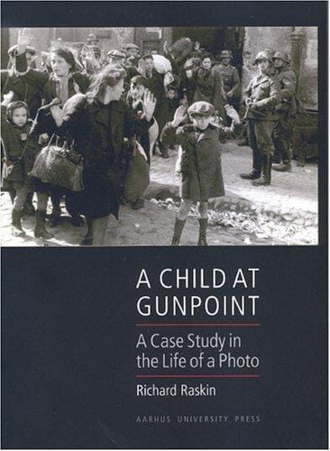 A child at gunpoint: a case study in the life of a photo