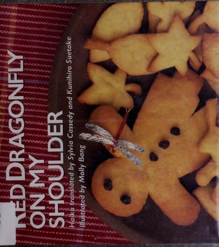 Red dragonfly on my shoulder: haiku