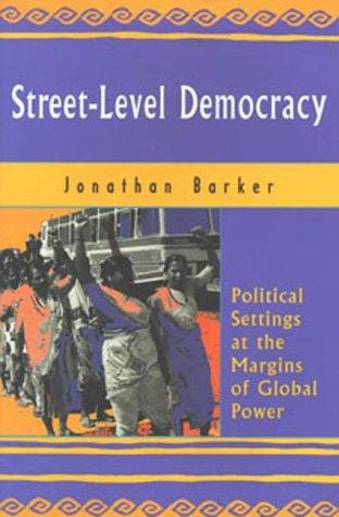Street-level democracy: political settings at the margins of global power