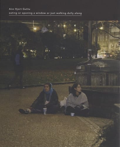 Ane Hjort Guttu eating or opening a window or just walking dully along