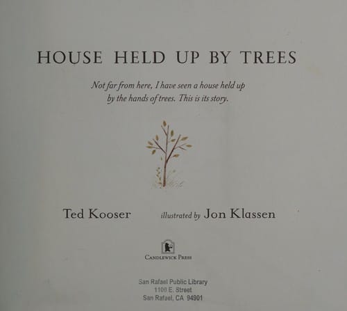 House held up by trees