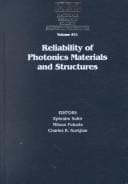 Reliability of photonics materials and structures