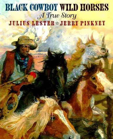 Black cowboy, wild horses