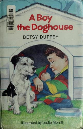 A boy in the doghouse