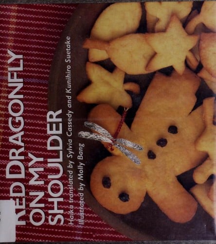 Red dragonfly on my shoulder: haiku