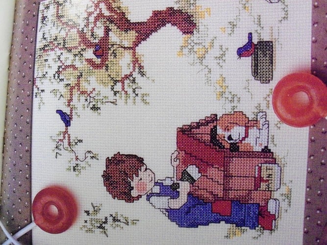 Sarah Kay - An Undated Calendar with Designs in Counted Cross Stitch