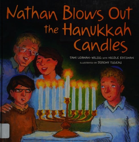 Nathan blows out the Hanukkah candles