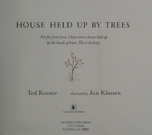 House held up by trees