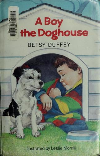 A boy in the doghouse